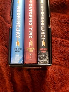 The Hunger Games Novel Trilogy Boxed Set - Black with Gold/Orange Mockingjay